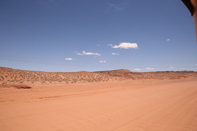 Scenic view of desert against sky