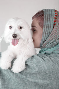 Maltese white dog with her mommy