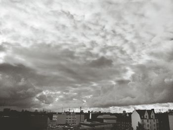 Built structure against cloudy sky