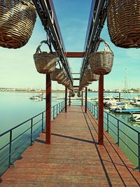 View of pier over sea against sky