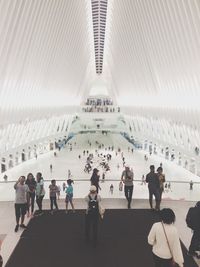 Group of people walking in city