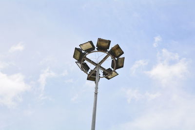 Low angle view of street light against sky