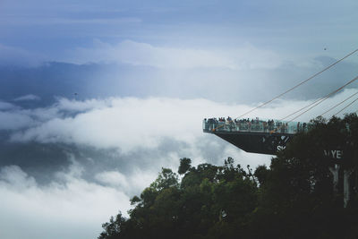 Scenic view of trees against sky