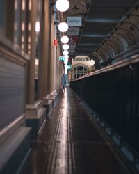 Woman walking at railroad station platform