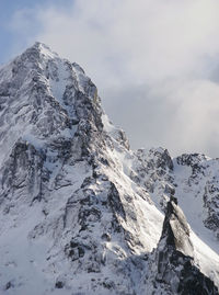 Scenic view of snowcapped mountain against sky