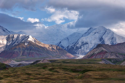 Scenic view of snowcapped mountains against sky