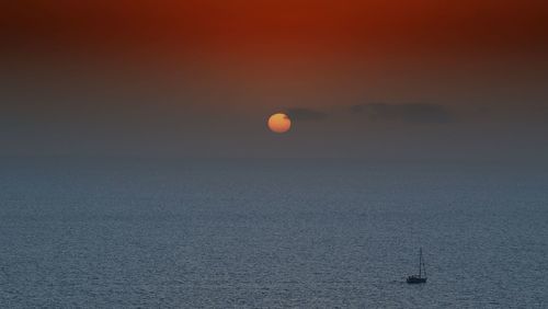 Scenic view of sea during sunset