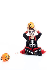 Boy with toy against white background