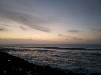 Scenic view of sea against sky during sunset