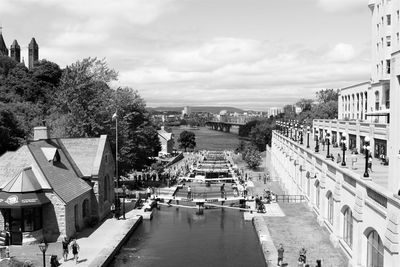 High angle view of canal along buildings