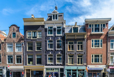 Low angle view of buildings against sky