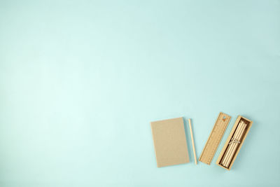 High angle view of stuffed toy on table against white background