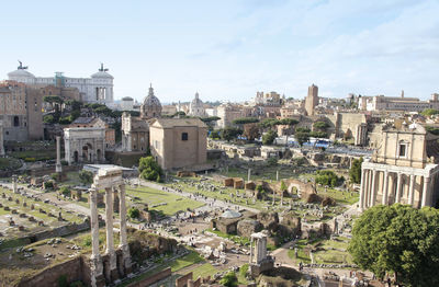 Aerial panoramic cityscape view of the roman forum during sunset in rome, italy