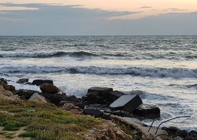 Scenic view of sea against sky during sunset