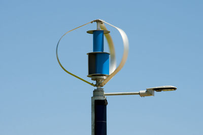 Low angle view of street light against clear sky