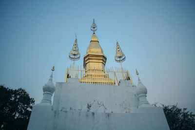 Low angle view of building against blue sky