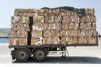 A view of a truck with recycled papers and cardboards in the customs of kos, greece