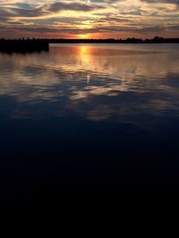 Scenic view of sunset over river