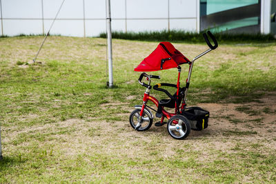 Cars parked on grassy field