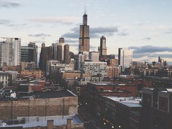 Scenic view of cityscape against sky