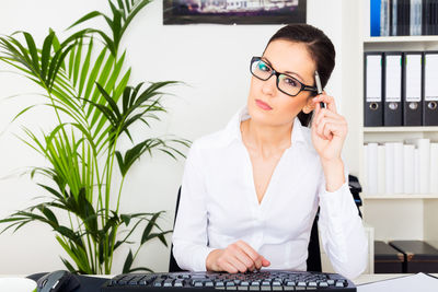 Young woman using mobile phone
