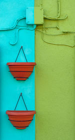 Flower pots on wall