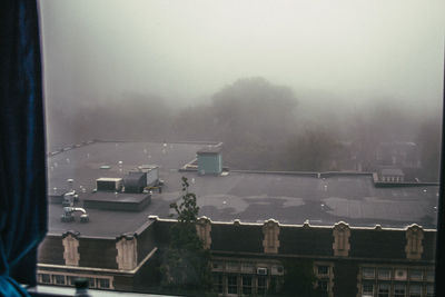 Houses in foggy weather