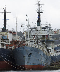 Trawlers moored at harbor