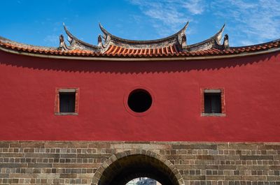 Facade of building against blue sky