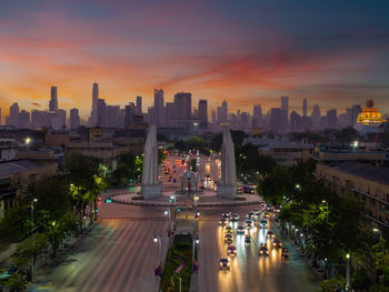 High angle view of city at sunset
