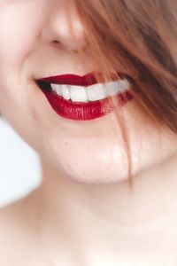 Cropped image of woman with red lipstick