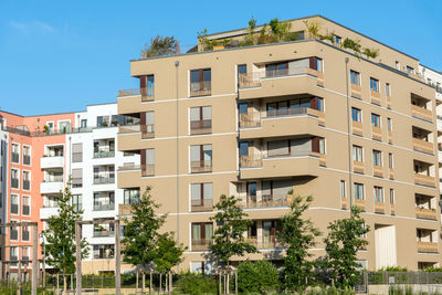 Modern beige townhouse seen in berlin, germany