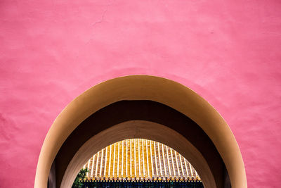 Low angle view of pink building