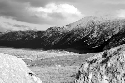 Scenic view of mountains against sky during winter