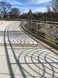 Shadow of trees on footpath