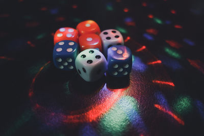 Colourful dice with lots of lighting effect gambling concept