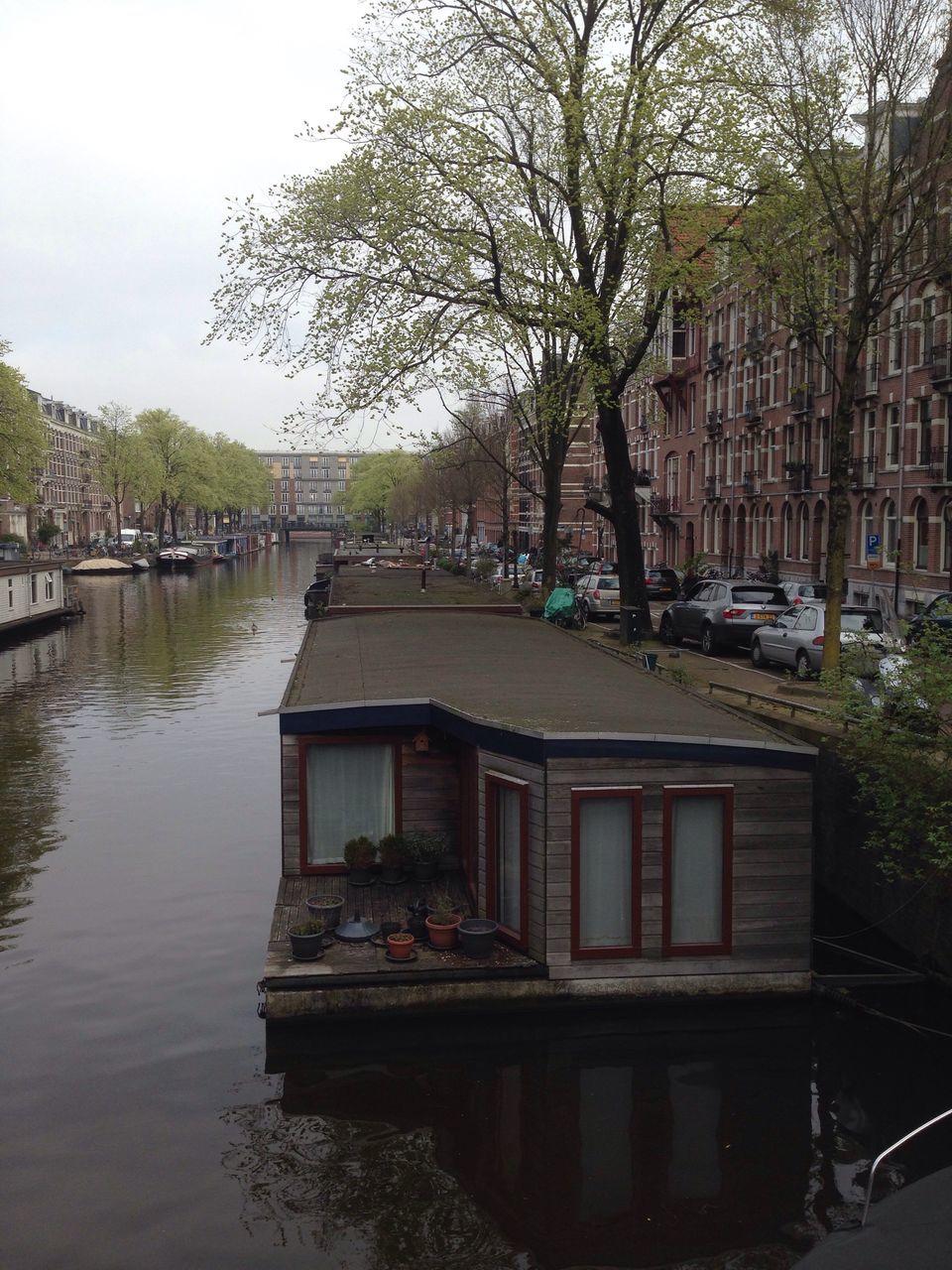 tree, water, building exterior, outdoors, architecture, sky, built structure, no people, day, nautical vessel, nature