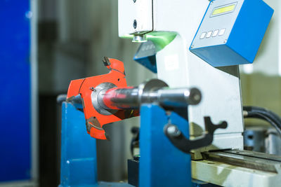 Close up of machine balancing of cutting metal bits