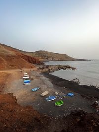 Scenic view of beach against clear sky