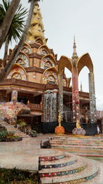 Statue of temple against sky