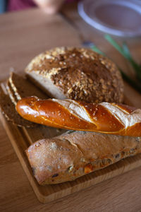 Fresh german bread on the wooden board. high quality photo