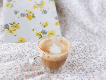 High angle view of coffee cup on table