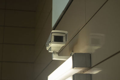 Surveillance video camera. security system in the subway. video recording in a public place. 