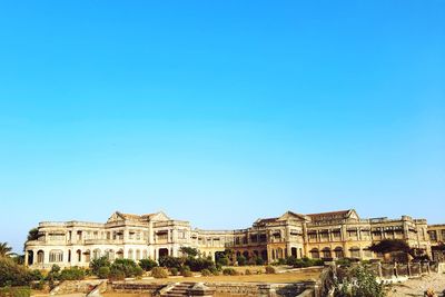 Buildings against blue sky