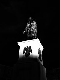 Low angle view of statue against sky