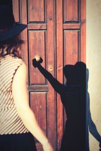 People standing by door entrance