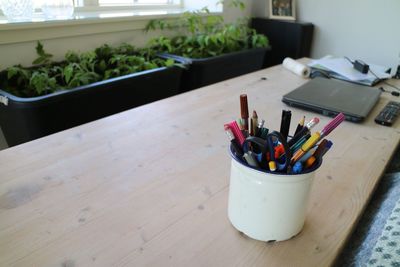 Close-up of colored pencils on table