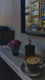 Coffee cup on table at home