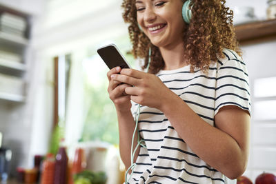 Young woman using mobile phone