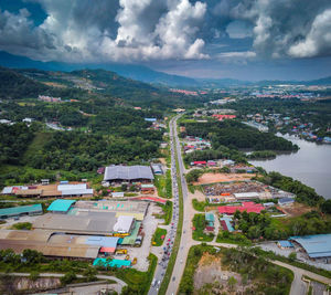 High angle view of buildings in city against sky